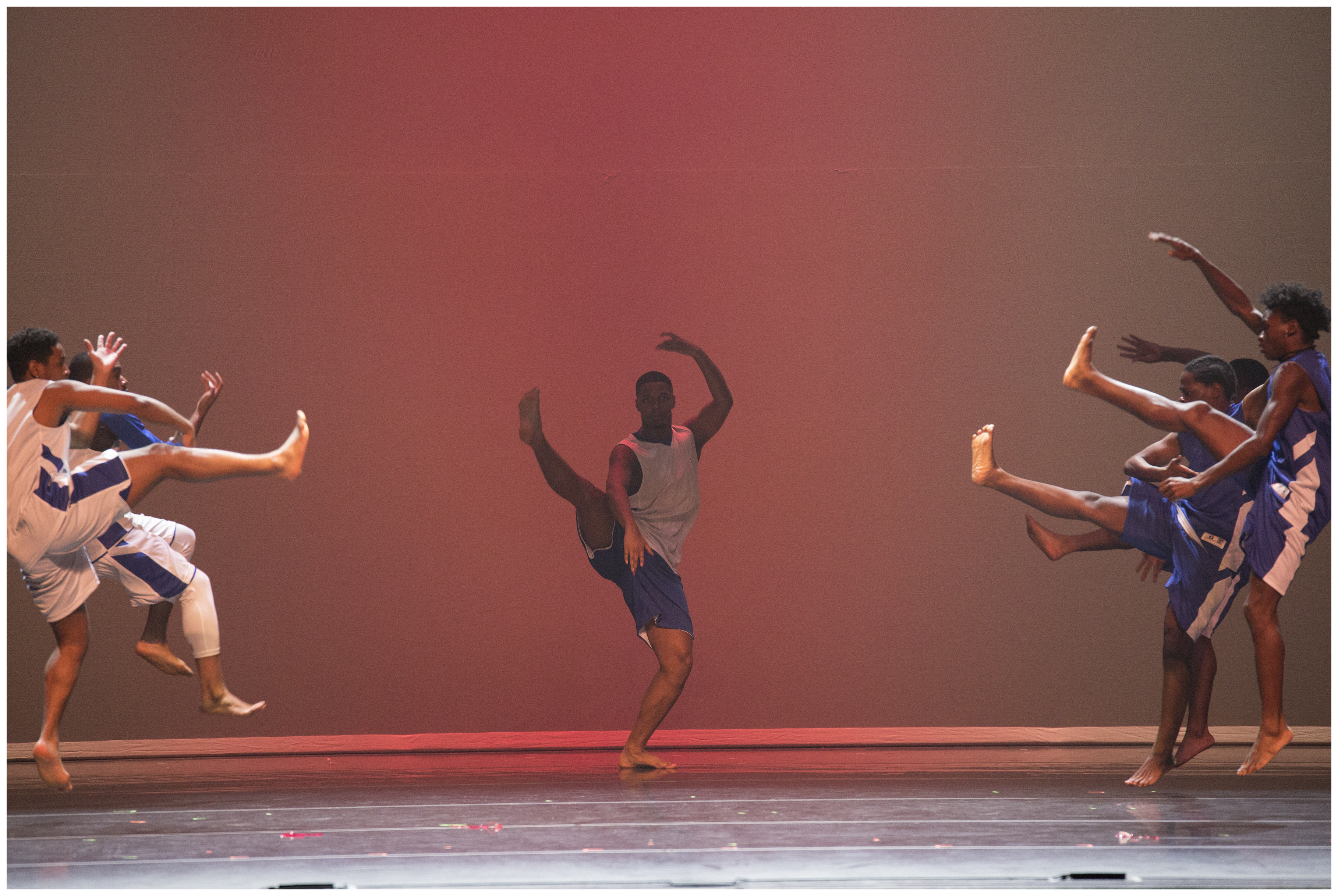 A group of male performers onstage at the 2018 Potpourri of the Arts